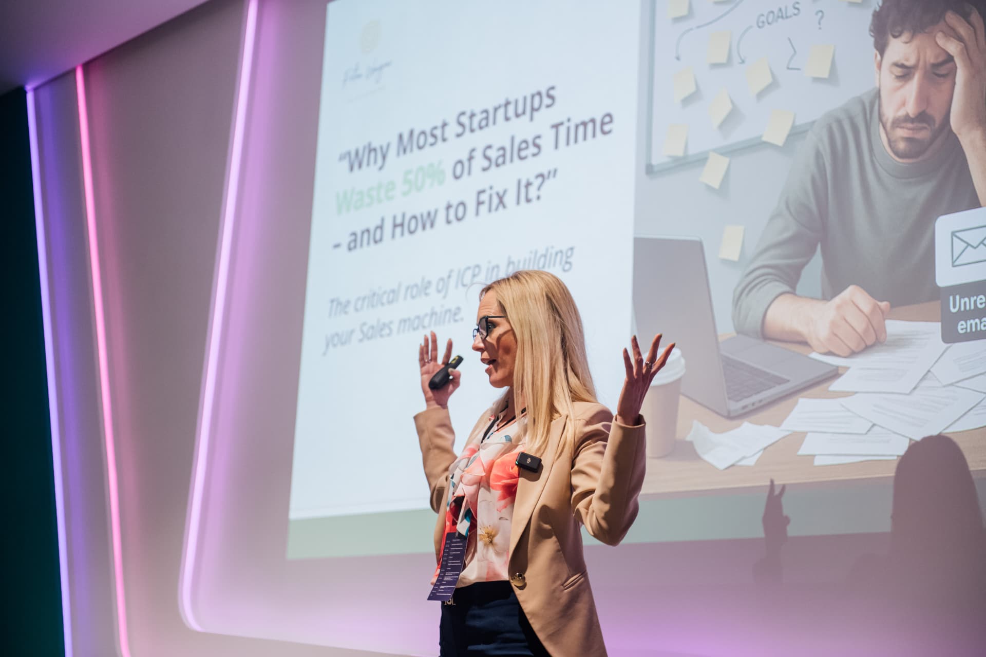 Petra Wagner speaking on stage about how startups waste sales time