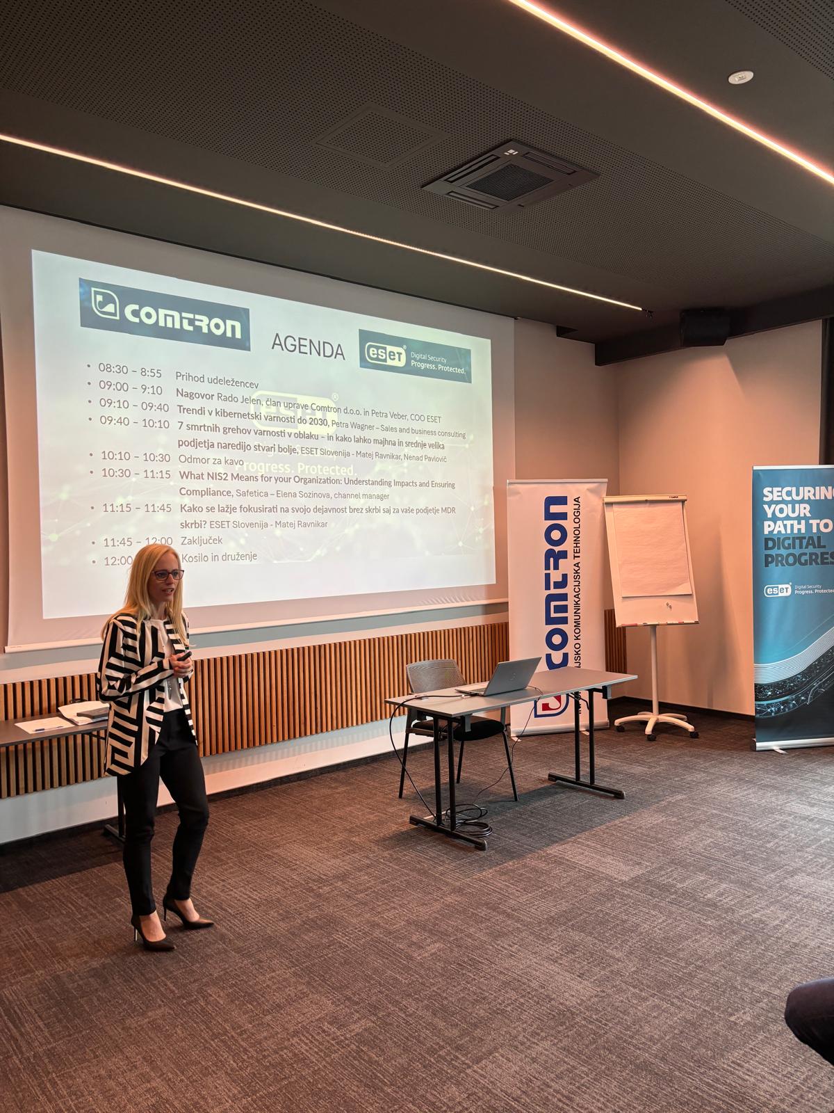 Petra Wagner facilitating a corporate advisory session with the agenda projected behind her